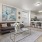 Model living room at The Ivy at Draper 55 plus community in Utah, featuring wood grain flooring and counter seating.